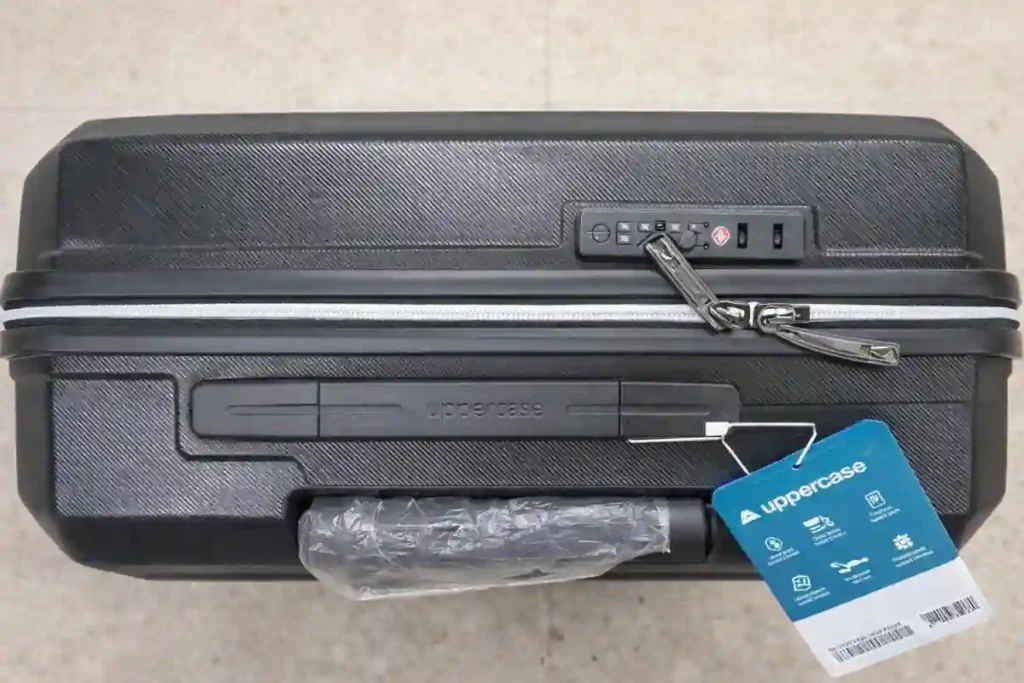 Close-up of Uppercase anti-puncture double zipper with integrated TSA lock for luggage security