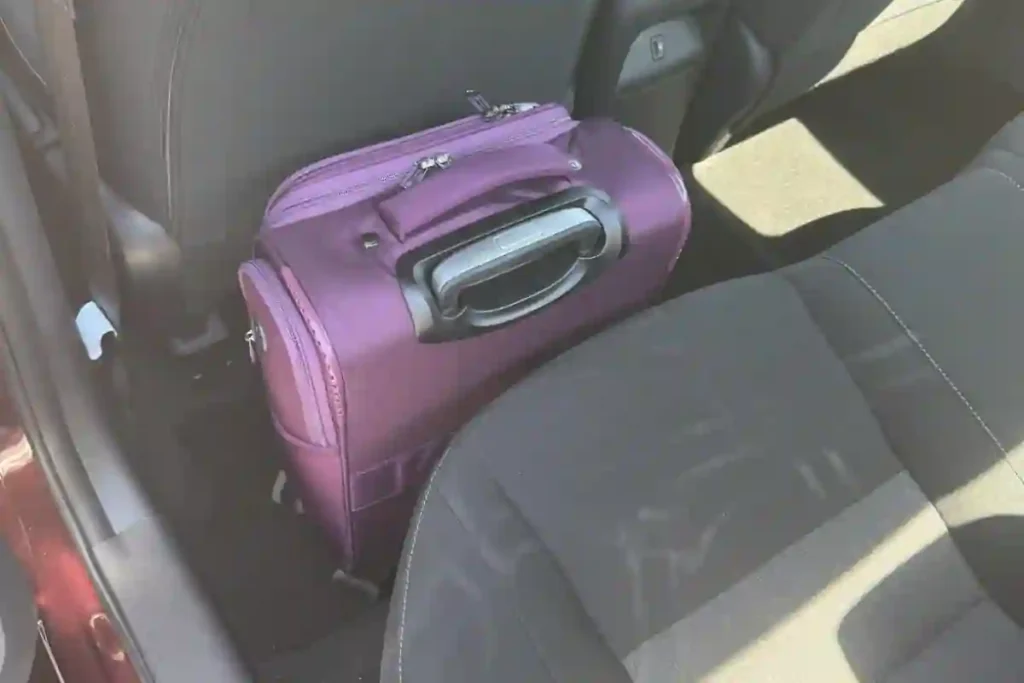 Softside underseat spinner luggage with four wheels and TSA lock for budget travelers